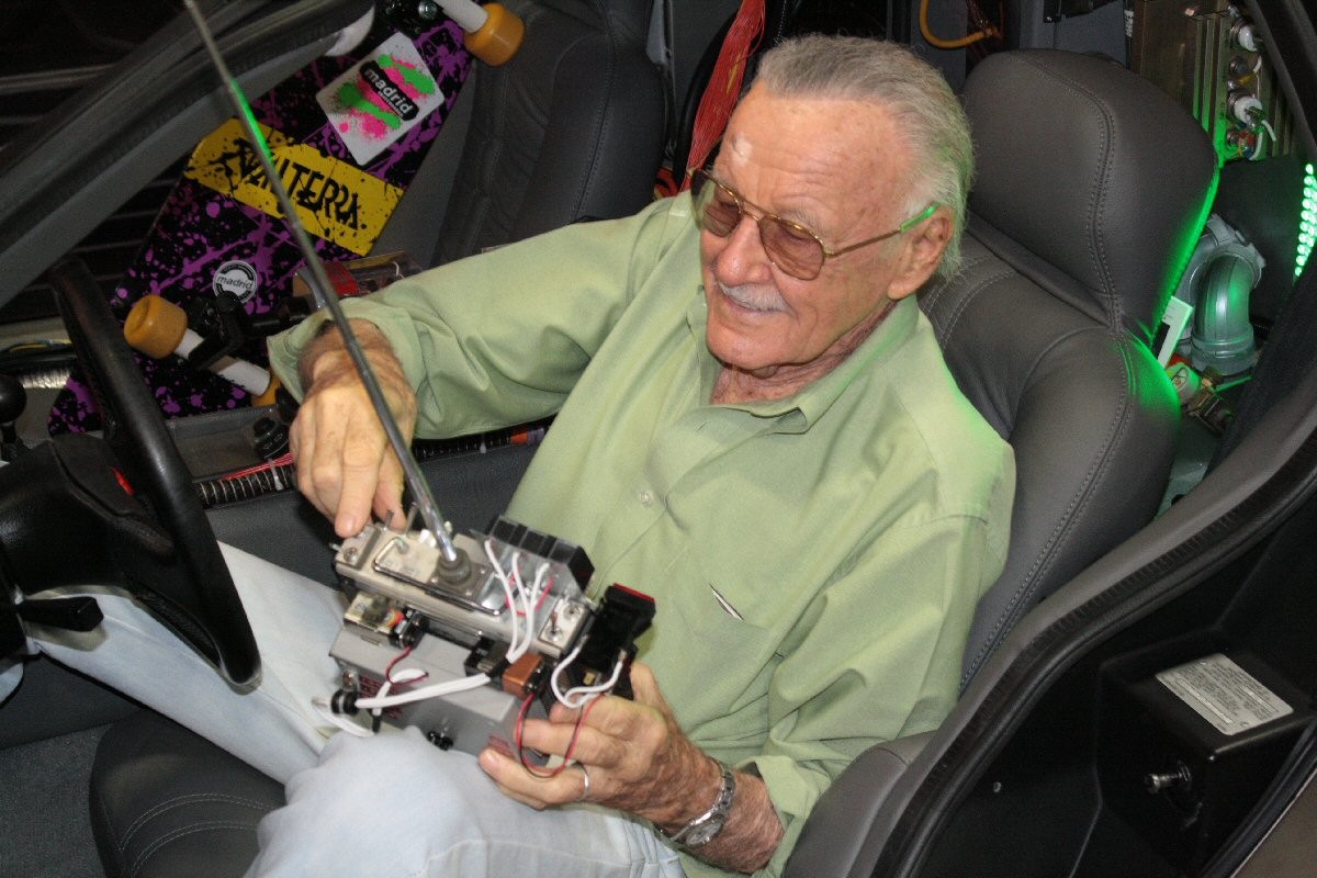 Stan Lee holding the remote i built.jpg
